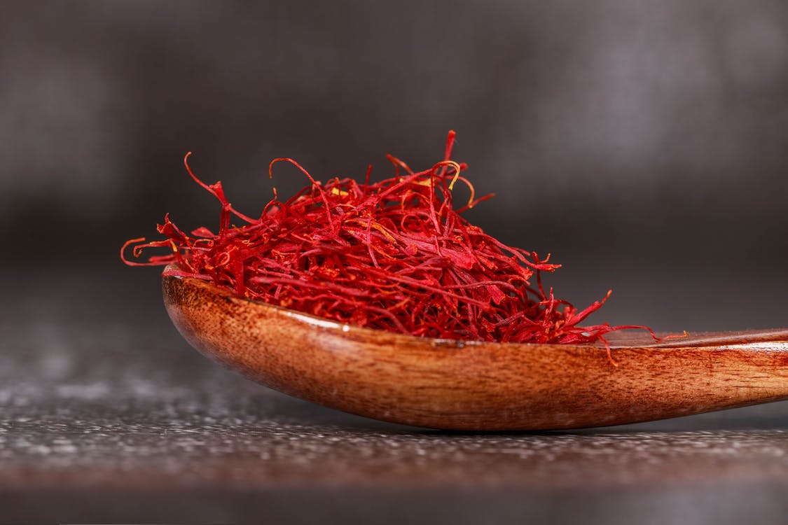 Free Red Saffron Spice on Brown Wooden Spoon Stock Photo